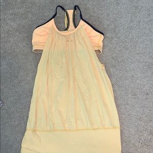 Yellow lululemon tank top with built in bra.